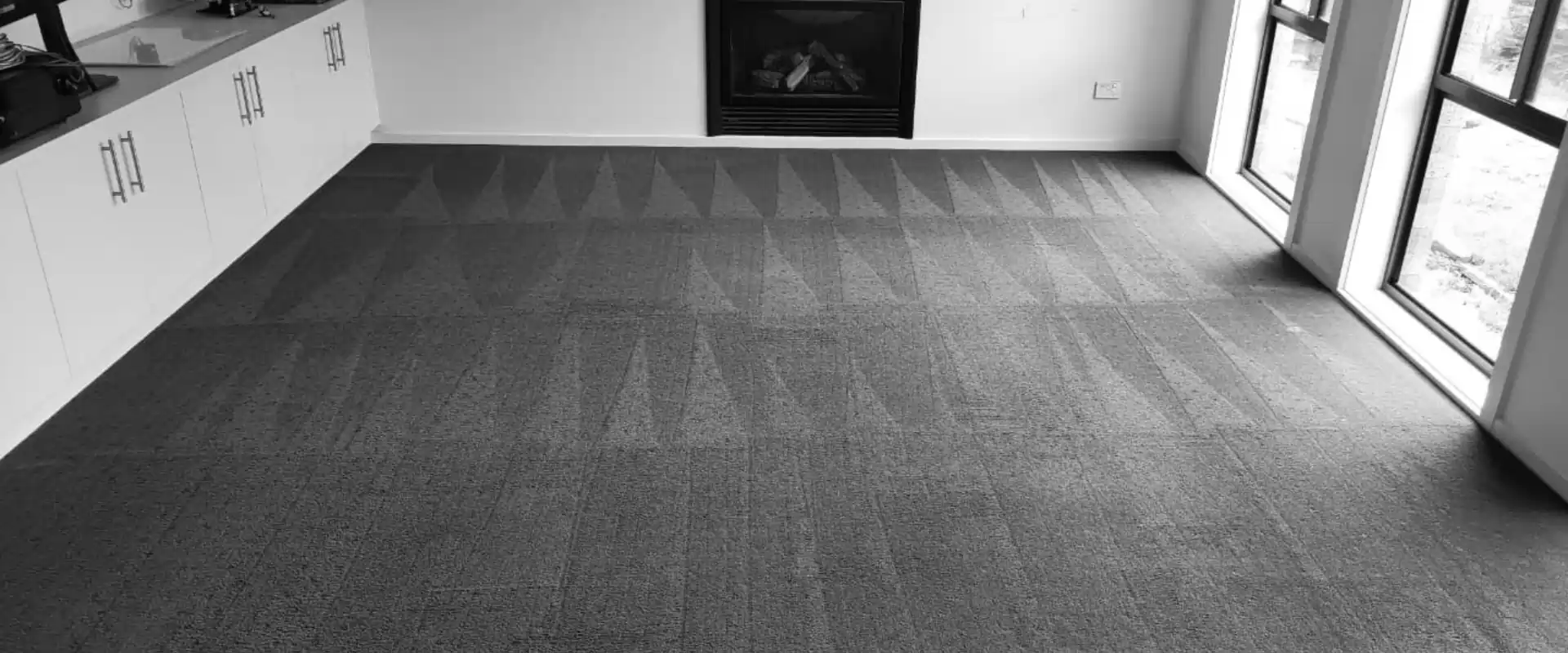 Emergency Flood Restoration Geelong – Rapid Dry Carpet Cleaning - rapid dry Technician extracting flood water from soaked carpet in a Geelong home