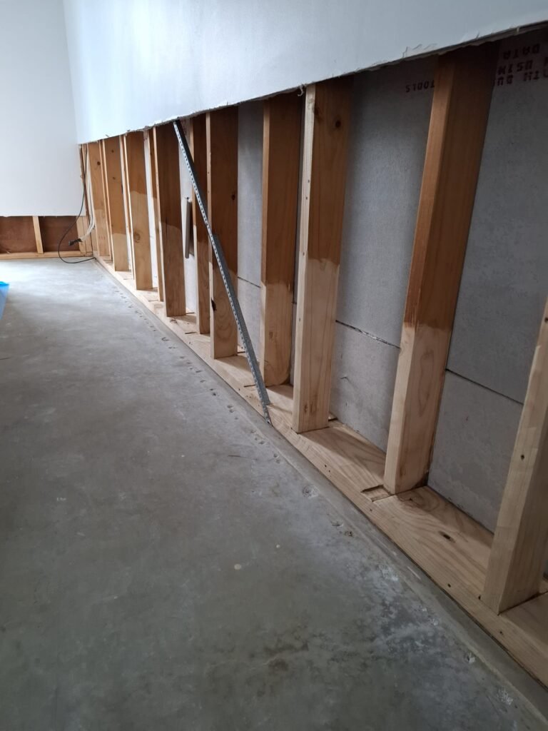 Professional mould remediation process in a Geelong property, showing containment and air scrubbing equipment.